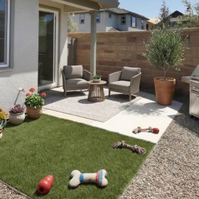 a backyard with a grill, chairs and dog toys